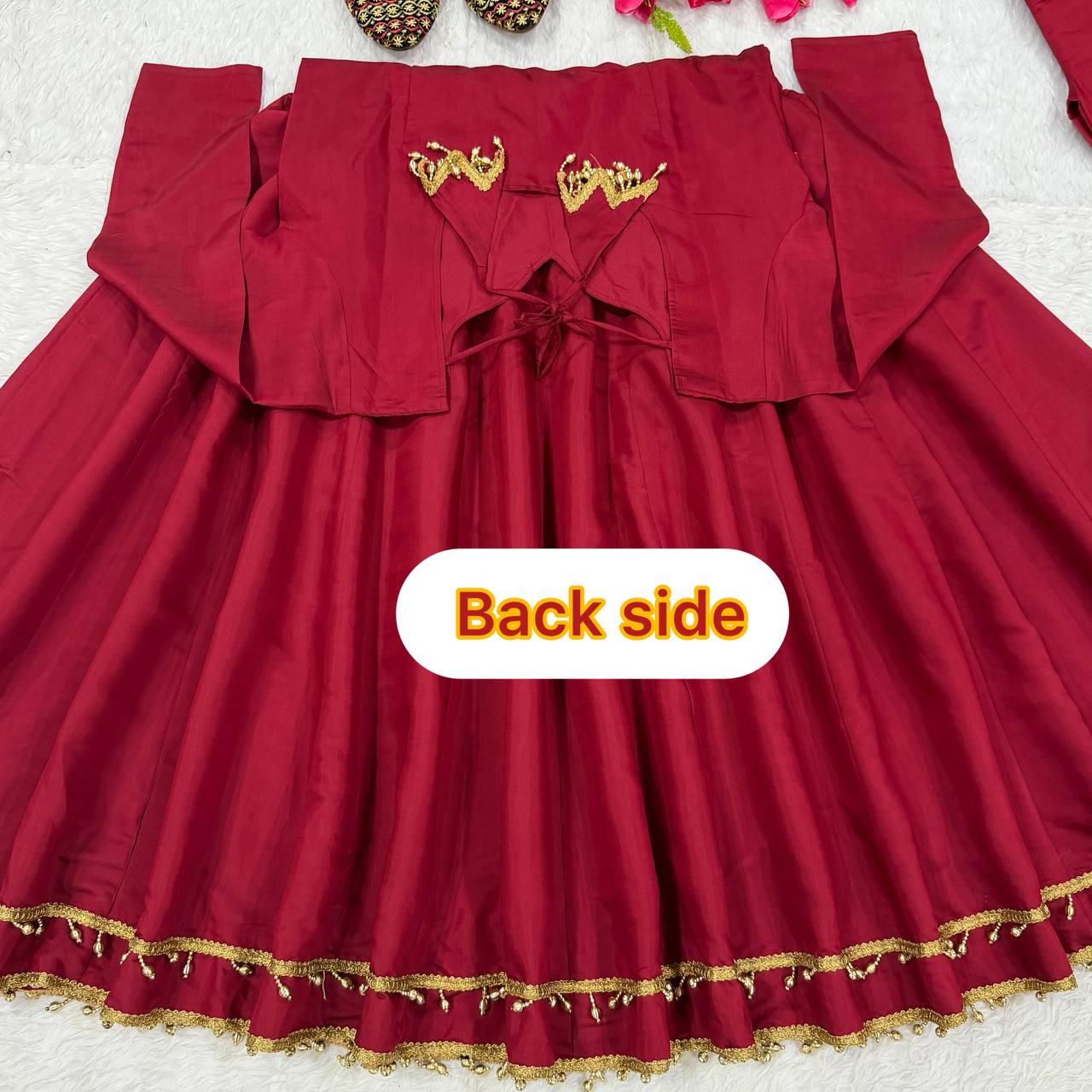 Regal Crimson Red Flared Anarkali Suit Set Adorned with Heritage Gold Motifs and Pearl-Embellished Scalloped Borders